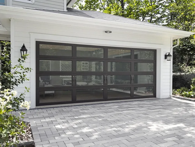 Miami Gardens Garage Door Repair design specialist presenting custom garage door options to Miami Gardens homeowner