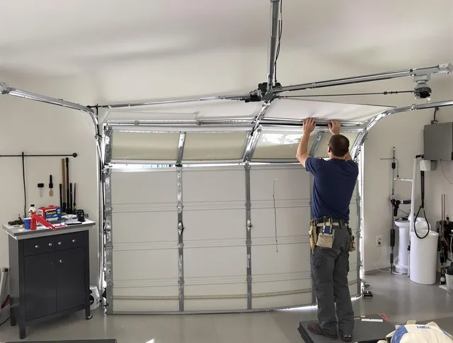 Miami Gardens Garage Door Repair specialist performing precise section replacement on Miami Gardens garage door