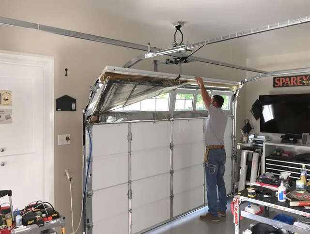 Garage door section replacement by Miami Gardens Garage Door Repair in Miami Gardens