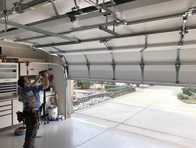 Garage door track repair service by Miami Gardens Garage Door Repair in Miami Gardens